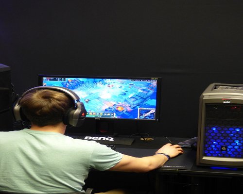 Sydney hotel gaming weekend with players at desktop monitors