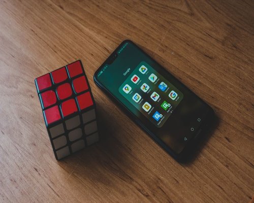 Smartphone displaying a colourful fictional puzzle game